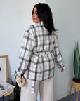 Checked shirt with a belt, cotton and polyester, with long sleeves and a classic design, suitable for everyday style.