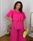 Комплект от памучна Fabric с волан, съдържащ 70% cotton и 30% polyester, показан на изображението.