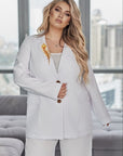 Стилно дамско Printed blazer , изработено от polyester, lycra и nylon, подходящо за ежедневен и елегантен стил.