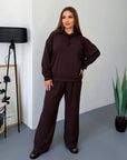Soft set of ribbed knit fabric with polyester, viscose and elastane, shown on a model.