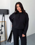 Soft ribbed-knit set with polyester, viscose and elastane, image of fashion set for comfort and style.