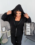 Fleece-lined set with rhinestones made from cotton, polyester and elastane, shown in the image.