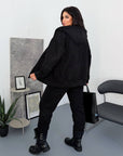 Fleece-lined set with rhinestones, composed of cotton, polyester and elastane, shown in the image.