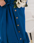 Dress with buttons
