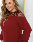Dress with lace sleeves