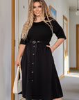 Midi-length dress with a belt