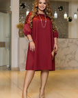Loose-fitting dress with embroidery