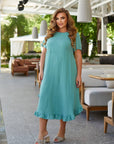 Loose-fit dress with ruffles