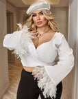 Blouse with feathers